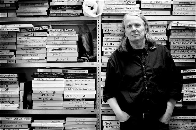 Harf Zimmermann standing in front of his archive
