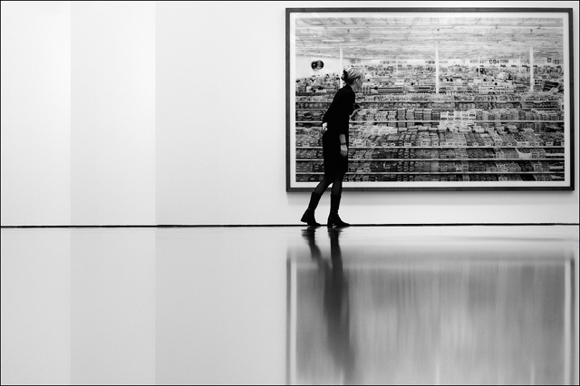 Visitor at press view of Andreas Gursky exhibition at Museum Kunstpalast Düsseldorf